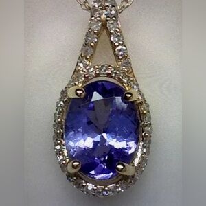 10K Yellow Gold Oval Shape Tanzanite and Diamond 0.15ct twt Pendant with Chain